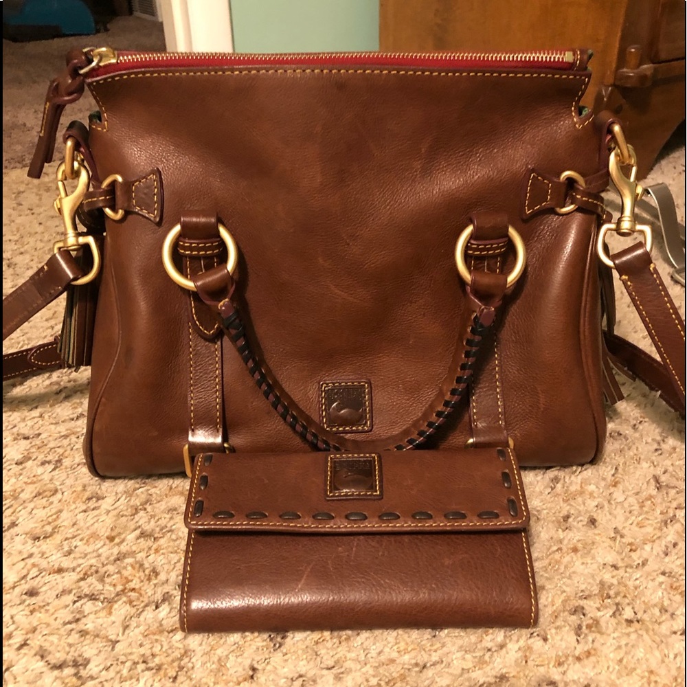 Dooney & Bourke leather purse and matching wallet.